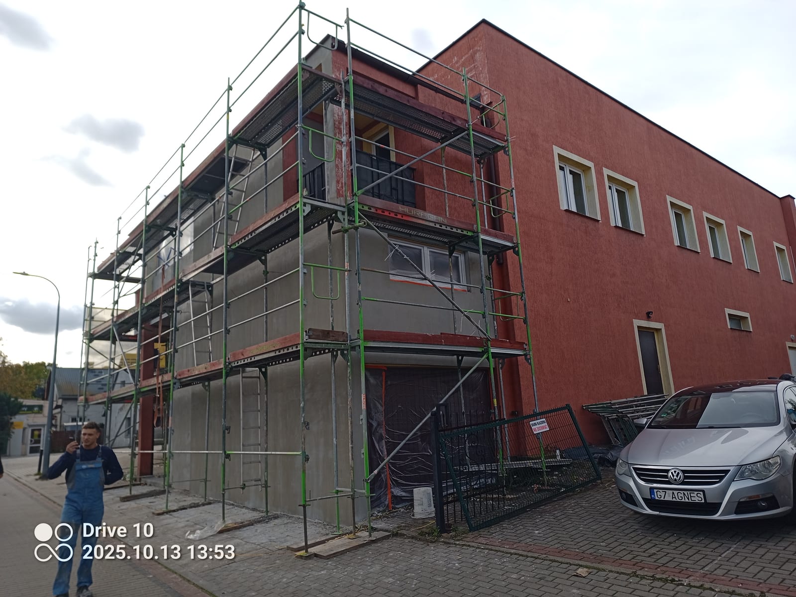 Facade insulation and render on a commercial building, Before