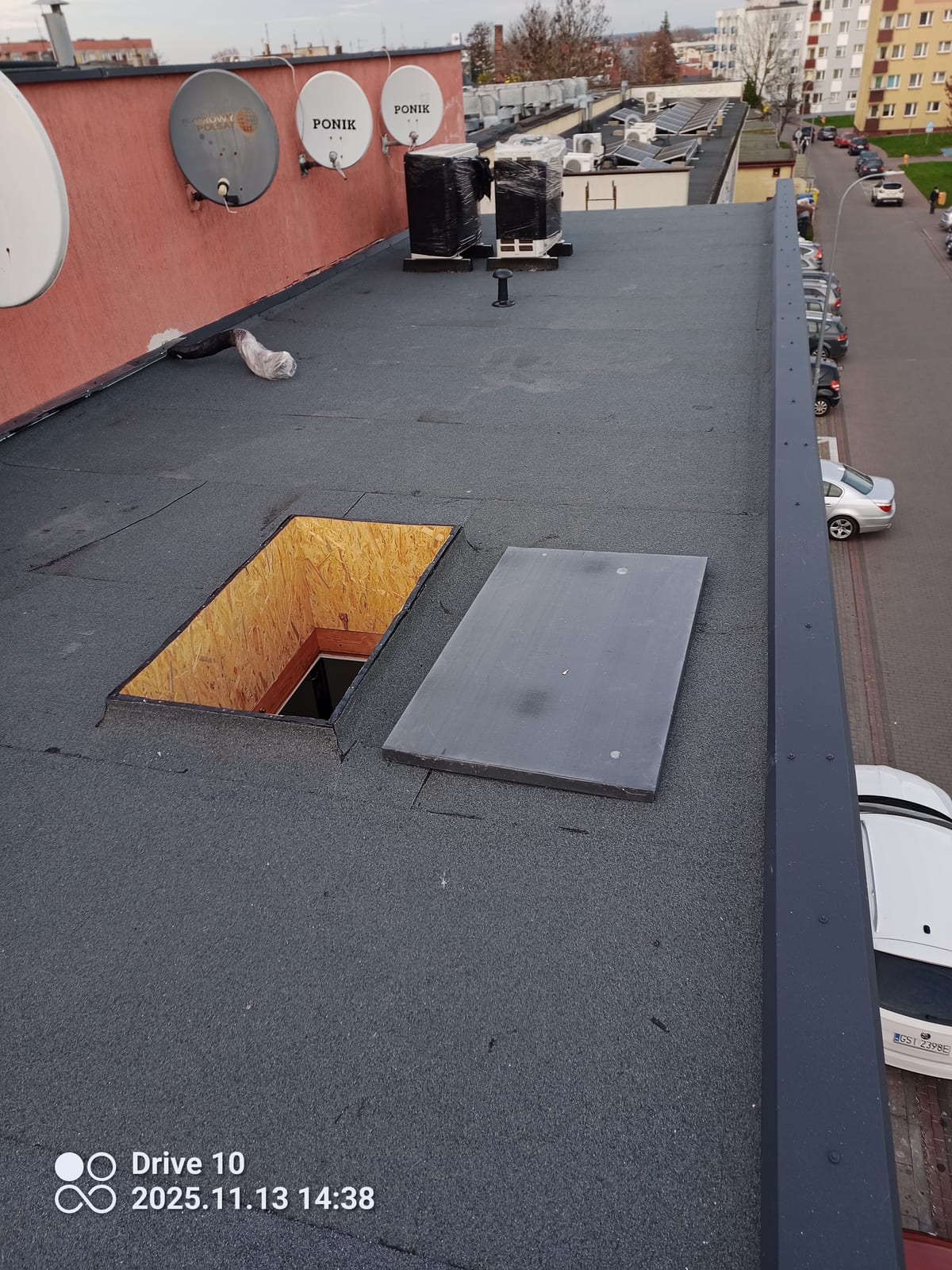 Flat roof renewed with roof hatch